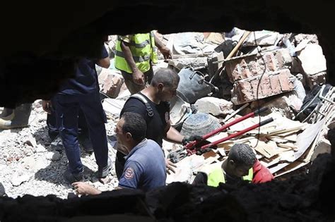 A 5-story apartment building collapses in Cairo and kills at least 9 people